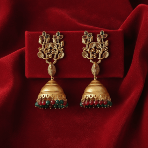 Traditional Antique Gold Jhumka Earrings with Green And Pink Bead Detailing and Floral Motif Design