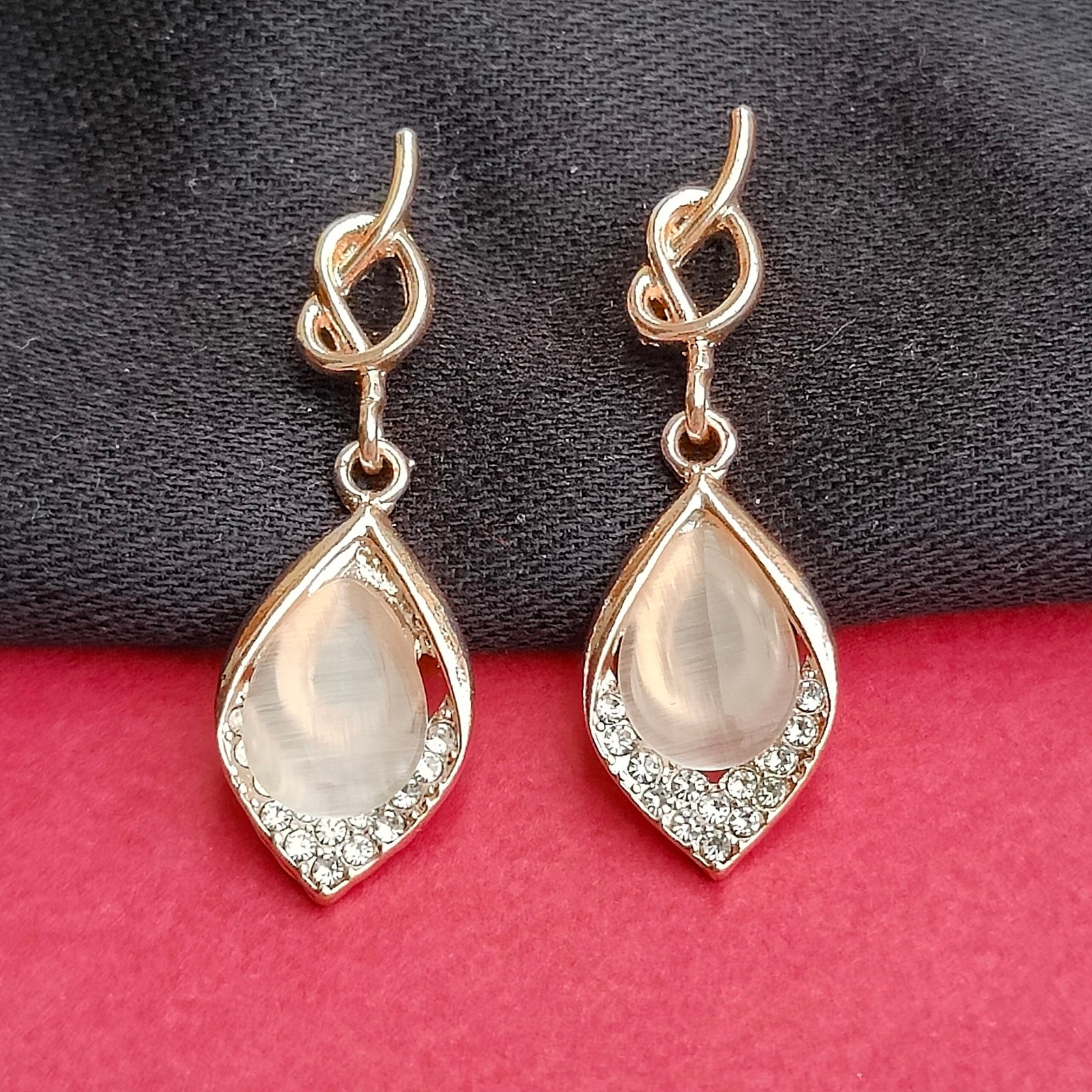 Elegant Rose Gold Knot Drop Earrings with Crystal Halo