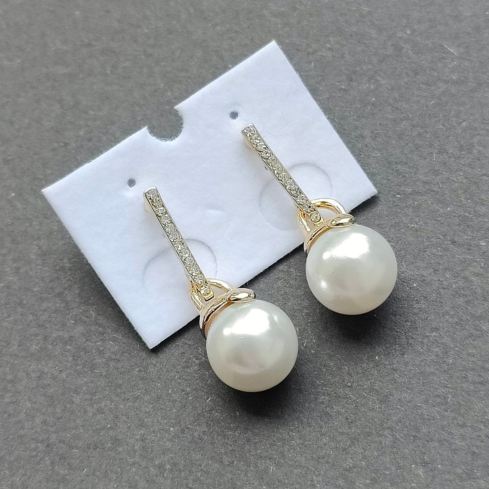 Elegant Pearl Drop Earrings with Crystal Bar Design - Image 2